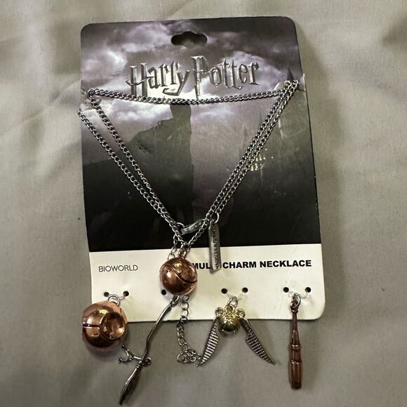 Harry Potter Multi charm Quidditch Necklace NWT - Picture 1 of 2